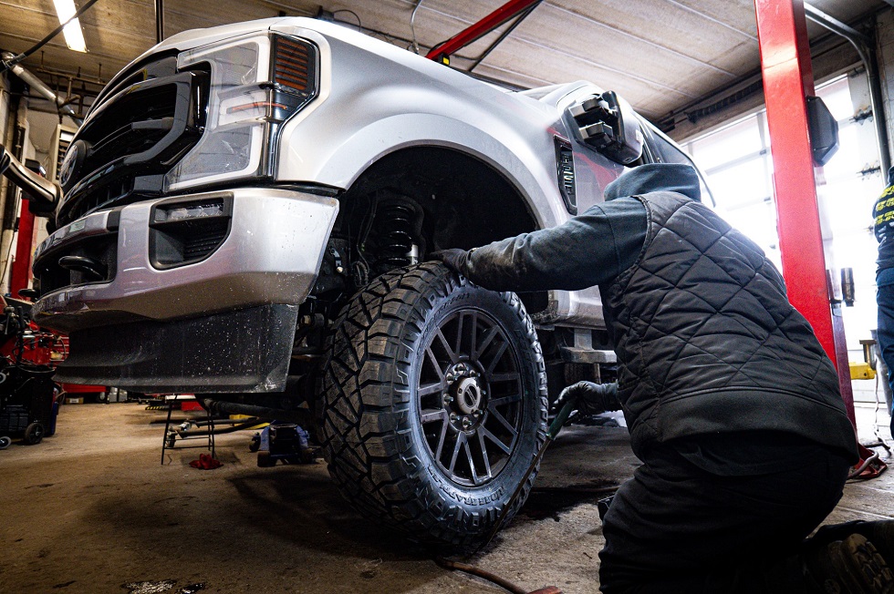 Lifted truck in garage